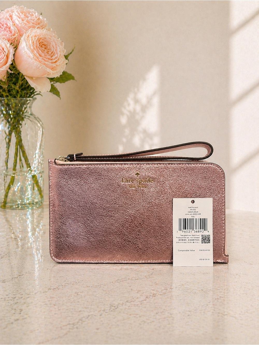 kate spade New York Metallic Rose Gold Wristlet